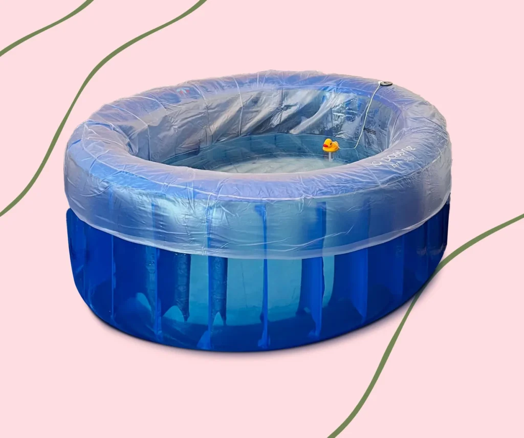 birth pool with a tiny yellow duck and filled with water