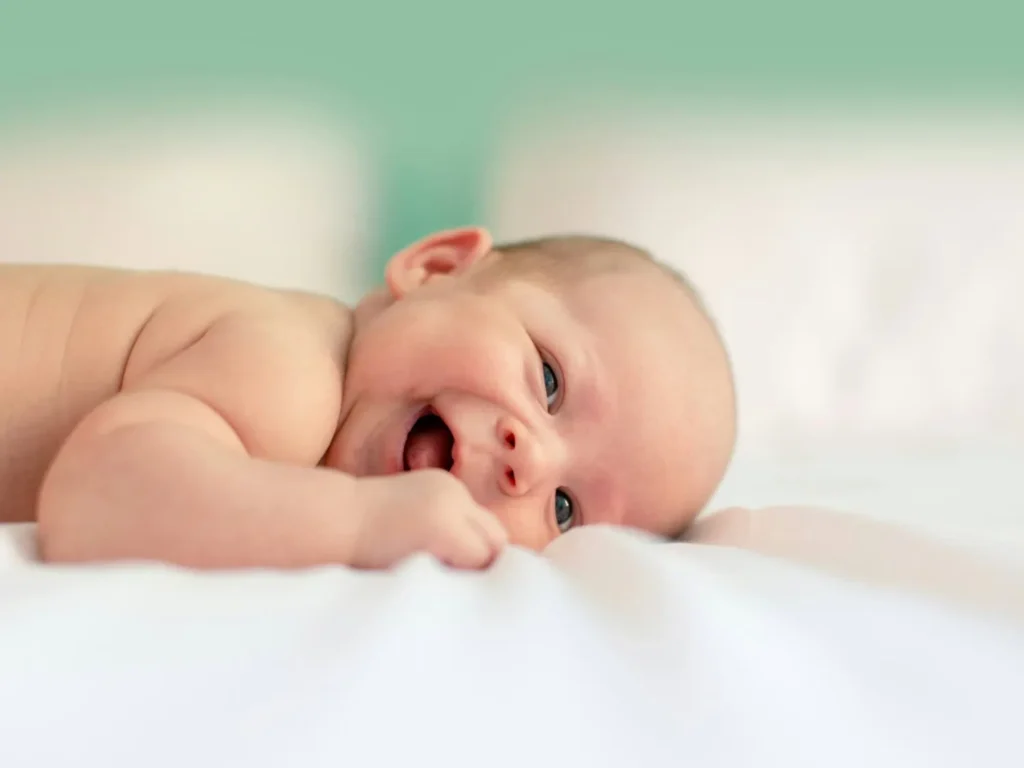 laughing baby during postpartum doula services